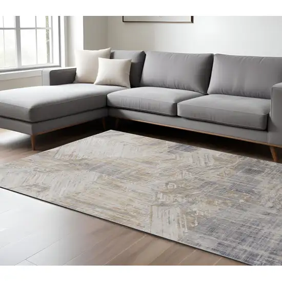 Tan and Ivory Abstract Power Loom Distressed Non Skid Area Rug Photo 1