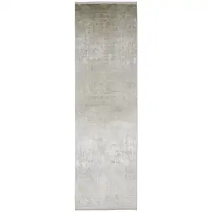 Photo of Tan Ivory And Gray Abstract Power Loom Distressed Runner Rug With Fringe