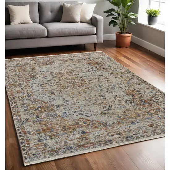 Tan and Ivory Floral Power Loom Non Skid Area Rug With Fringe Photo 1