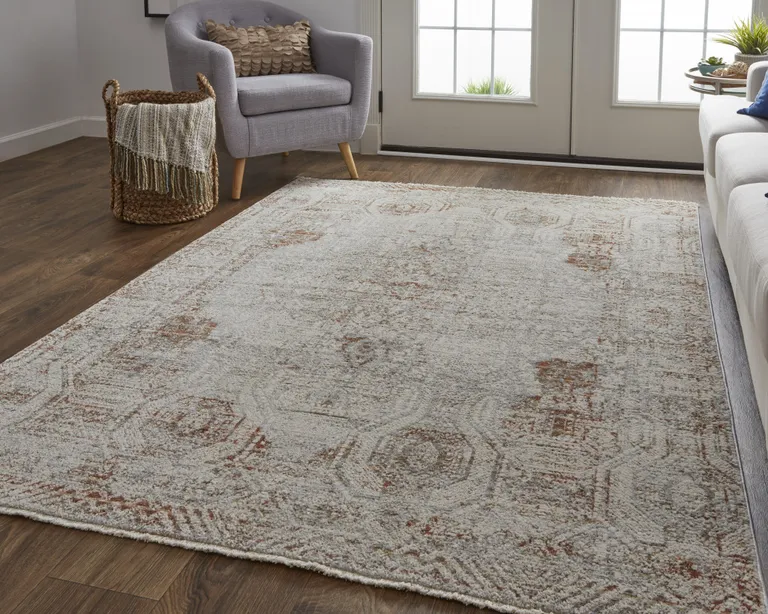 Tan Ivory And Orange Floral Power Loom Distressed Area Rug With Fringe Photo 4