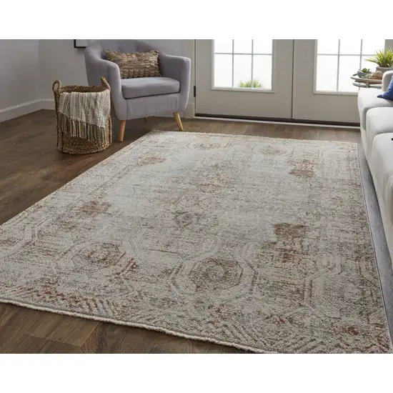 Tan Ivory And Orange Floral Power Loom Distressed Area Rug With Fringe Photo 6