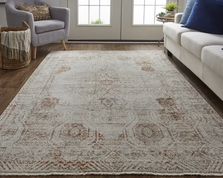 Tan Ivory And Orange Floral Power Loom Distressed Area Rug With Fringe Photo 3