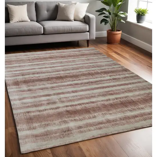 Tan and Ivory Abstract Hand Woven Area Rug Photo 1