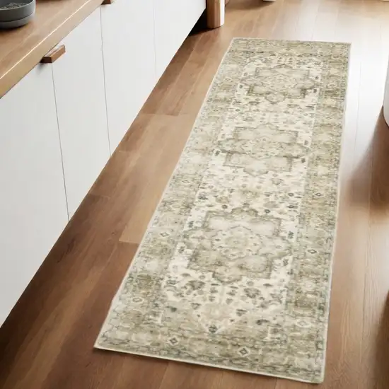 8' Tan and Ivory Oriental Power Loom Runner Rug Photo 1