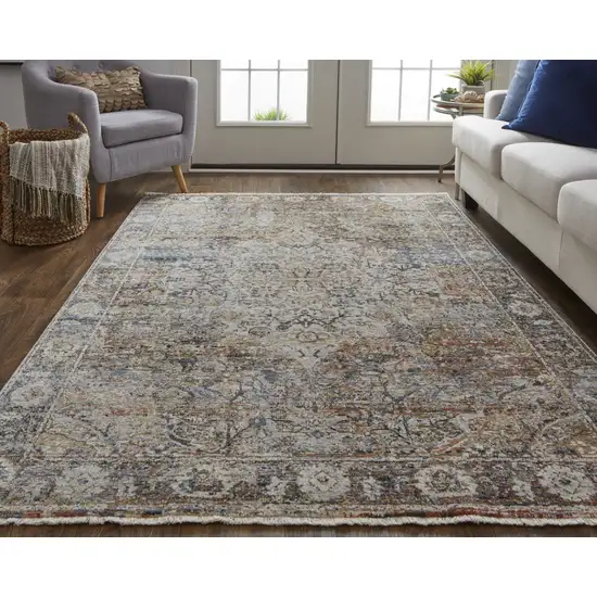 Tan Orange And Blue Floral Power Loom Distressed Area Rug With Fringe Photo 9