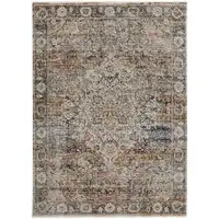 Photo of Tan Orange And Blue Floral Power Loom Distressed Area Rug With Fringe