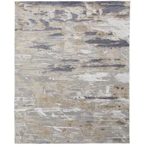 Photo of Tan Orange And Ivory Abstract Power Loom Distressed Area Rug