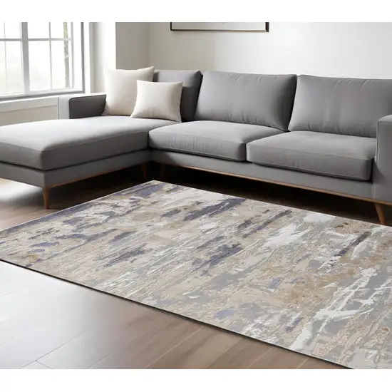 Tan and Ivory Abstract Power Loom Distressed Non Skid Area Rug Photo 1