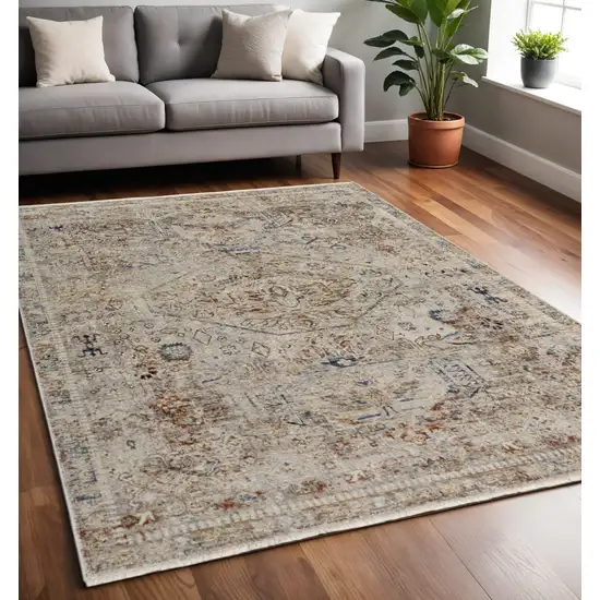 Tan and Red Floral Power Loom Distressed Non Skid Area Rug With Fringe Photo 1