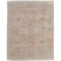 Photo of Tan Orange and Ivory Oriental Hand Woven Distressed Area Rug With Fringe