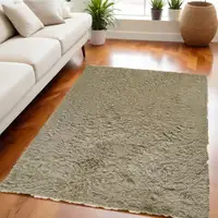 Photo of Tan Shag Hand Tufted Area Rug