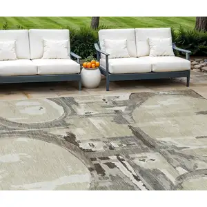 Photo of Tan Taupe And Beige Geometric Washable Indoor Outdoor Area Rug