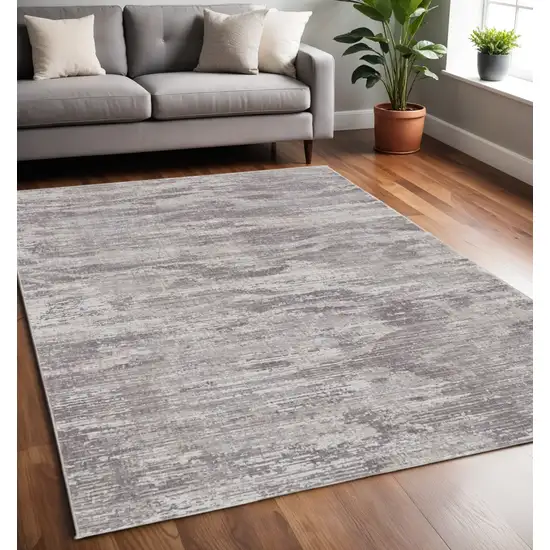 Tan and Gray Abstract Power Loom Distressed Area Rug Photo 1