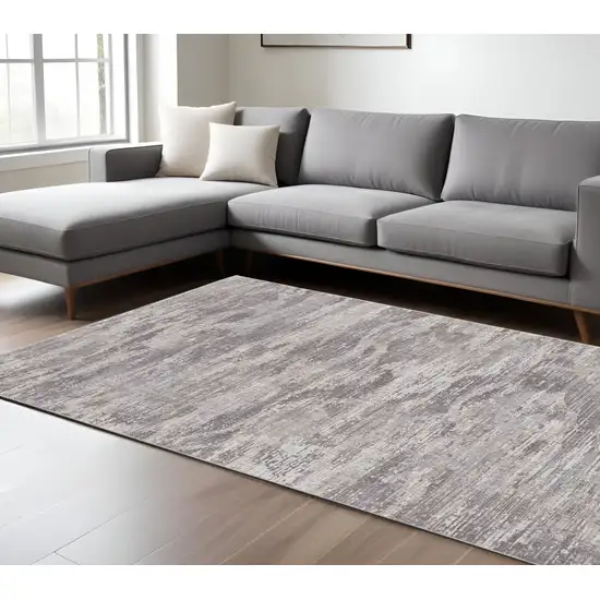 Tan and Gray Abstract Power Loom Distressed Area Rug Photo 1