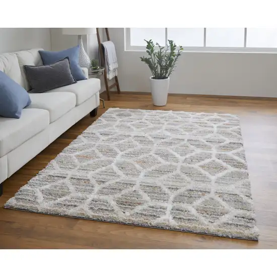 Tan Taupe And Ivory Geometric Power Loom Stain Resistant Area Rug Photo 6