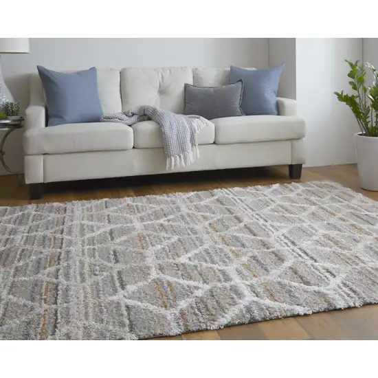 Tan Taupe And Ivory Geometric Power Loom Stain Resistant Area Rug Photo 8