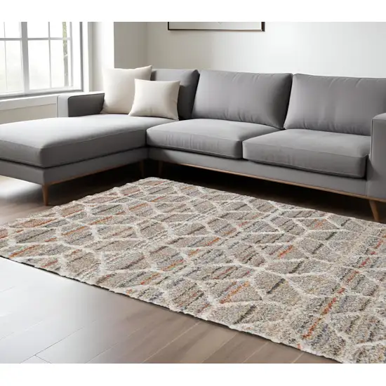 Tan and Ivory Geometric Power Loom Area Rug Photo 1