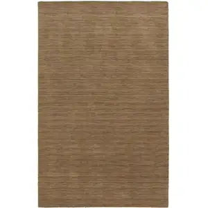 Photo of Tan Wool Hand Tufted Area Rug