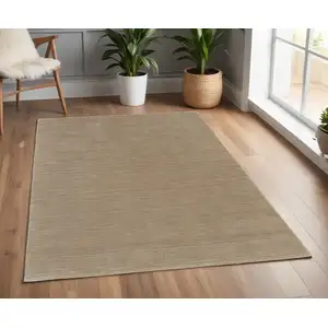 Photo of Tan Wool Hand Woven Area Rug