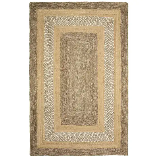 Tan and Beige Bordered Area Rug Photo 1