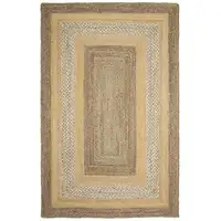 Photo of Tan and Beige Bordered Area Rug