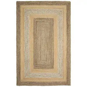 Photo of Tan and Beige Bordered Area Rug