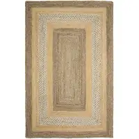 Photo of Tan and Beige Bordered Area Rug