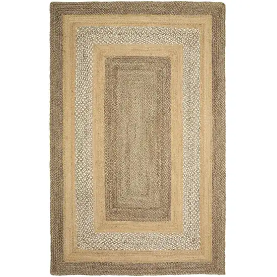 Tan and Beige Bordered Area Rug Photo 1