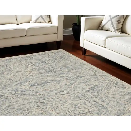 Tan and Blue Wool Geometric Area Rug Photo 1