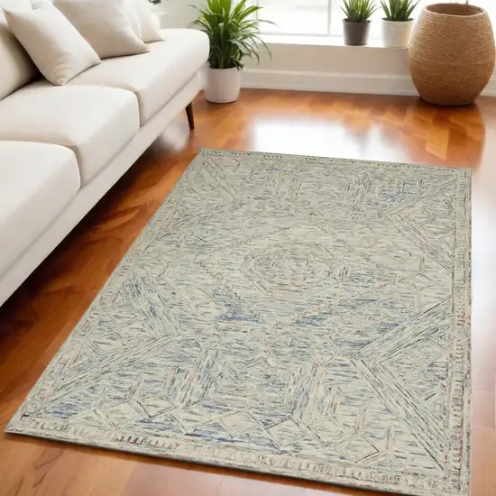 Tan and Blue Wool Geometric Area Rug Photo 1