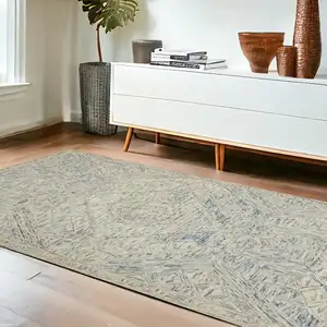 Photo of Tan and Blue Wool Geometric Area Rug