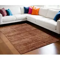 Photo of Tan and Brown Power Loom Area Rug