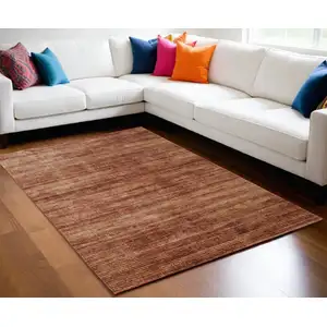 Photo of Tan and Brown Power Loom Area Rug