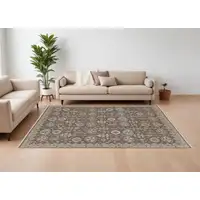 Photo of Tan and Brown Wool Oriental Hand Knotted Area Rug With Fringe