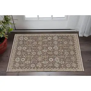 Photo of Tan and Brown Wool Oriental Hand Knotted Area Rug With Fringe