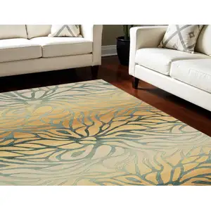 Photo of Tan and Gray Abstract Area Rug