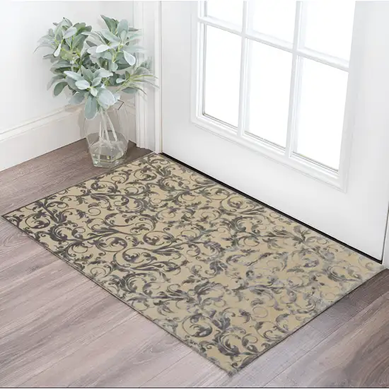 Tan and Gray Floral Power Loom Area Rug Photo 1