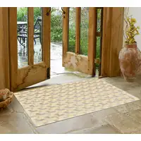 Photo of Tan and Gray Geometric Power Loom Area Rug