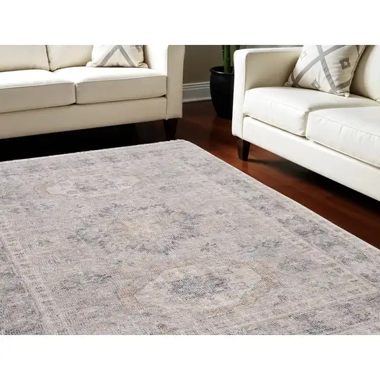 Tan and Gray Oriental Hand Woven Distressed Area Rug With Fringe Photo 1