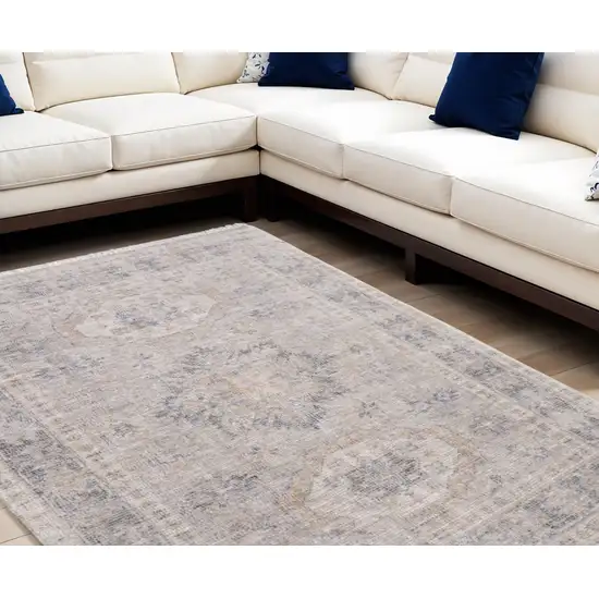 Tan and Gray Oriental Hand Woven Distressed Area Rug With Fringe Photo 1