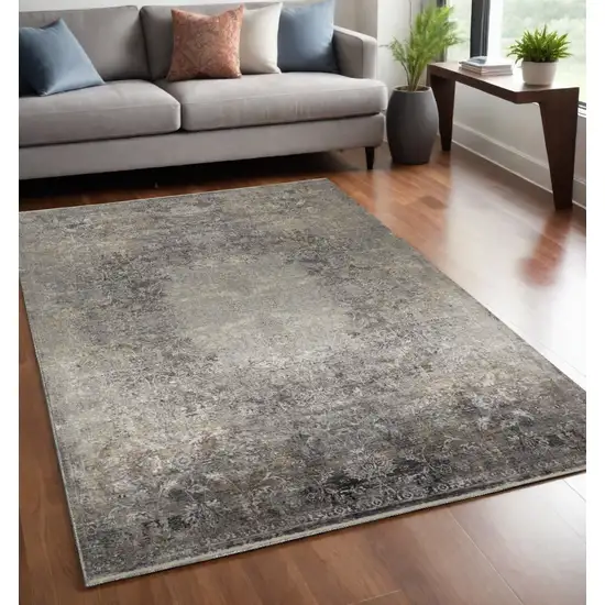 Tan and Gray Oriental Power Loom Worn Faded Area Rug Photo 1