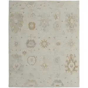 Photo of Tan and Gray Wool Floral Hand Knotted Area Rug