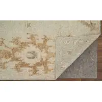 Photo of Tan and Gray Wool Floral Hand Knotted Area Rug