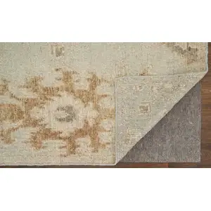 Photo of Tan and Gray Wool Floral Hand Knotted Area Rug