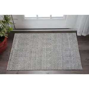 Photo of Tan and Gray Wool Geometric Hand Knotted Area Rug