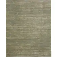 Photo of Tan and Green Power Loom Area Rug