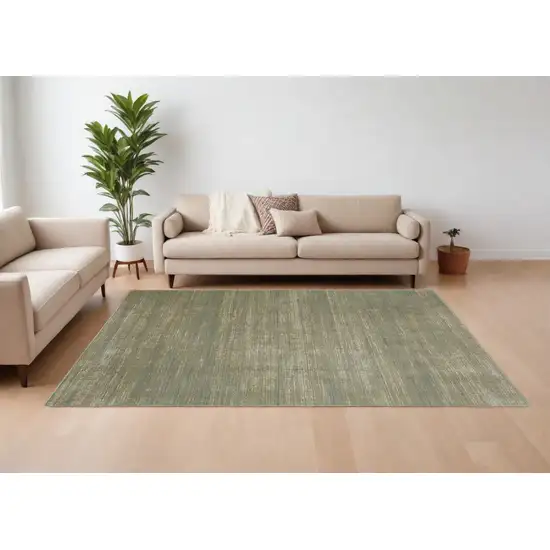 Tan and Green Power Loom Area Rug Photo 1