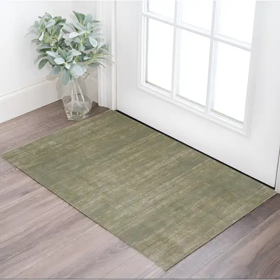 Tan and Green Power Loom Area Rug Photo 1