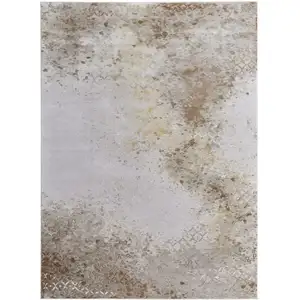 Photo of Tan and Ivory Abstract Power Loom Worn Faded Area Rug