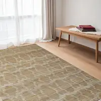 Photo of Tan and Ivory Geometric Hand Woven Area Rug